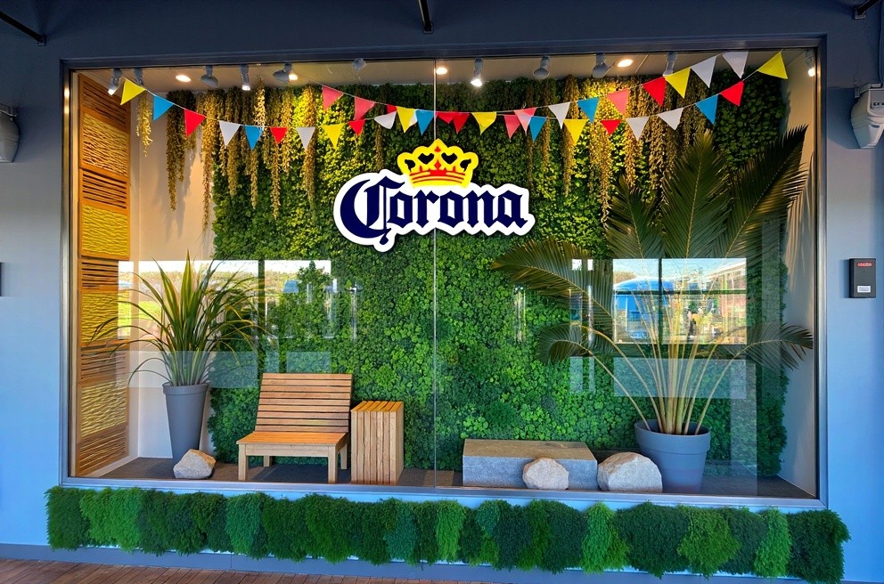 Corona Sign in Tropical Liquor Store Window Display