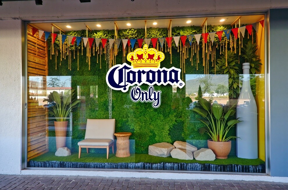 Corona Sign in Tropical Liquor Store Window Display